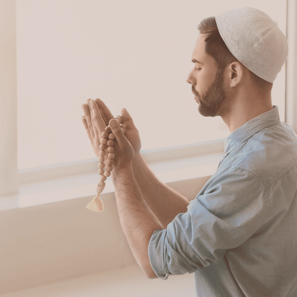 A person raising their hands in du’a (supplication), symbolizing faith, emotional release, and connection with Allah